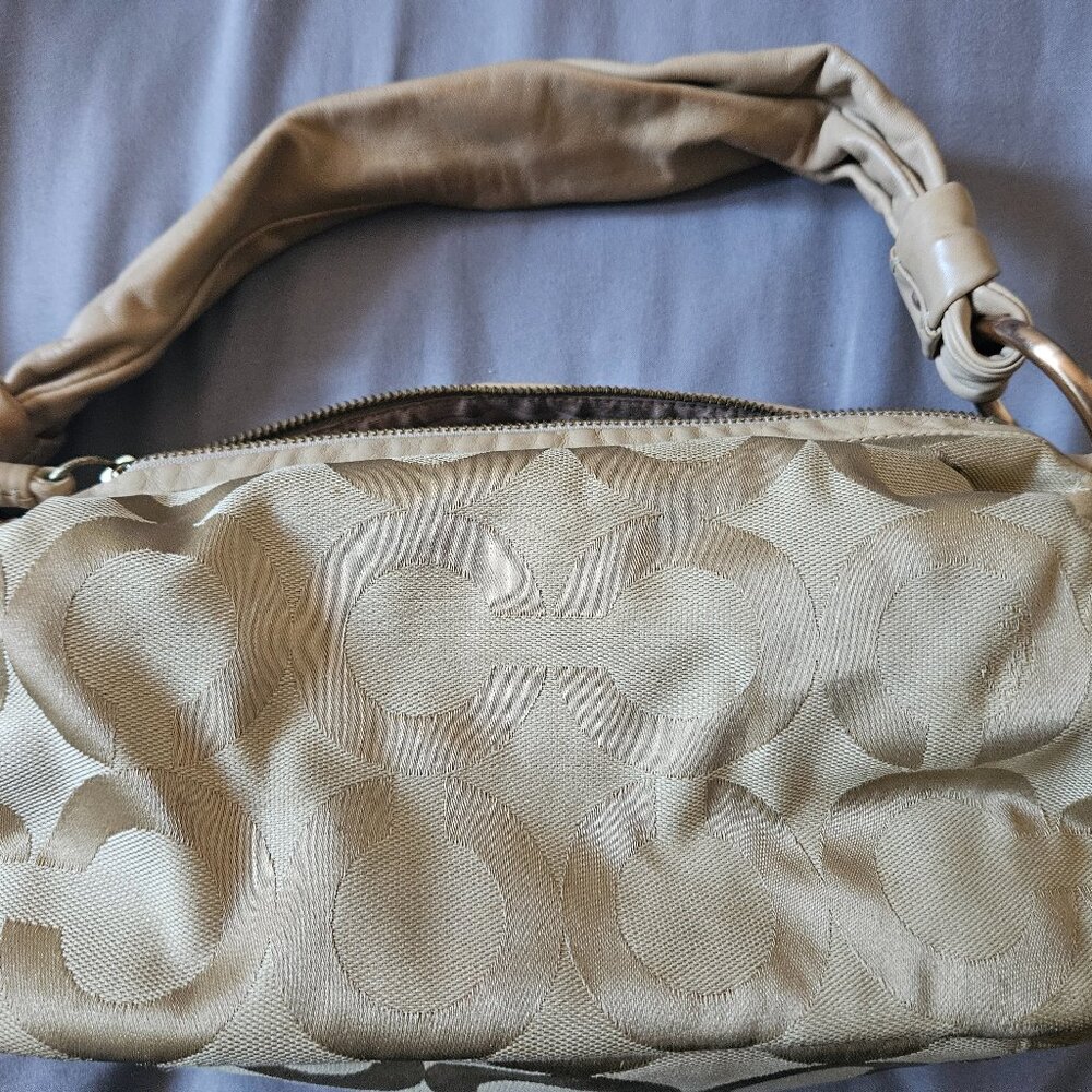 Tan Coach purse
